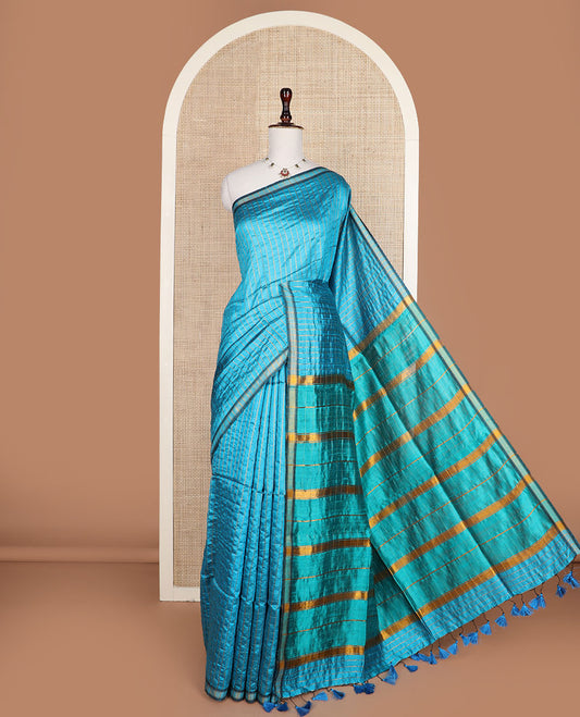 Blue checked tussar silk saree, zari border, and contrast striped pallu