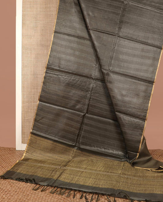 Borderless graphite grey sparsely striped tussar silk saree, striped pallu