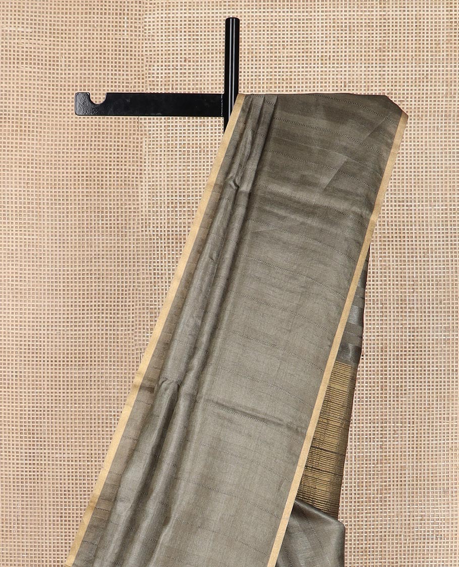 Borderless graphite grey sparsely striped tussar silk saree, striped pallu