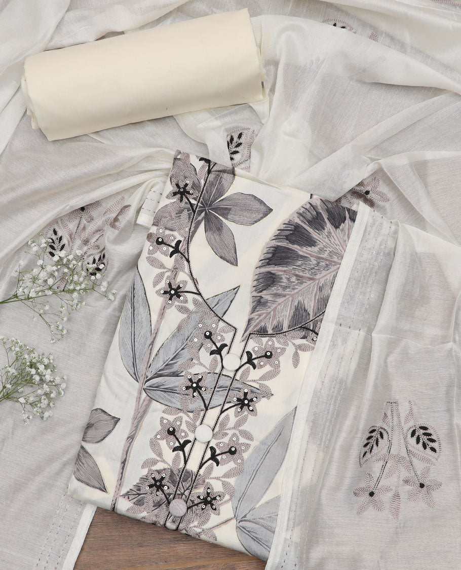 Cream material churidar set, floral print and embroidered top, plain bottom, and a floral embroidered dupatta