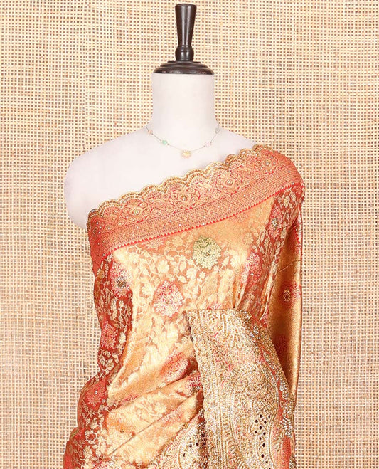 Gold Vastrakala Silk Saree, Enlivened with Floral Jacquard and Embroidery Work, Complemented by Contrast Traditional Zari and Cut Embroidered Scallop Border, Gleaming Grand Zari-Stone Work Pallu, and Paired with Contrast Heavy Stone Embroidered Blouse