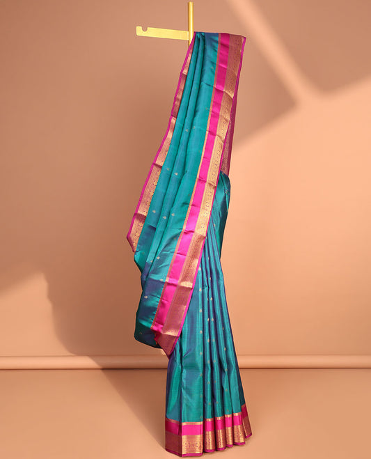 Blue floral buttas vasundhara elite silk saree with contrast zari design border & zari jaal design pallu