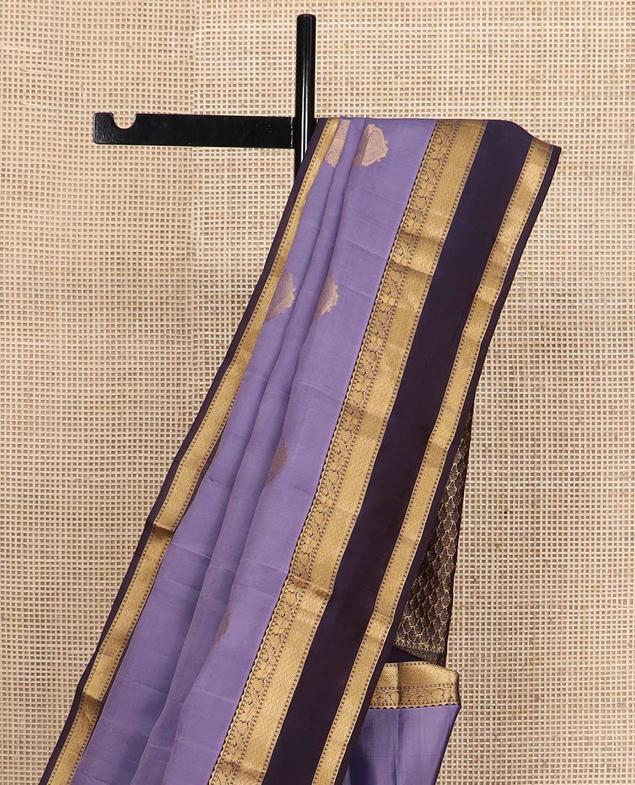 Lavender zari buttas Vasundhara silk mix saree, contrast rettai pettu border of manga, floral, and paiyaadi kattam designs, and zari design pallu