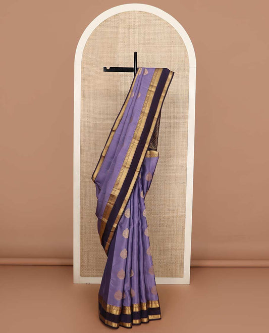 Lavender zari buttas Vasundhara silk mix saree, contrast rettai pettu border of manga, floral, and paiyaadi kattam designs, and zari design pallu