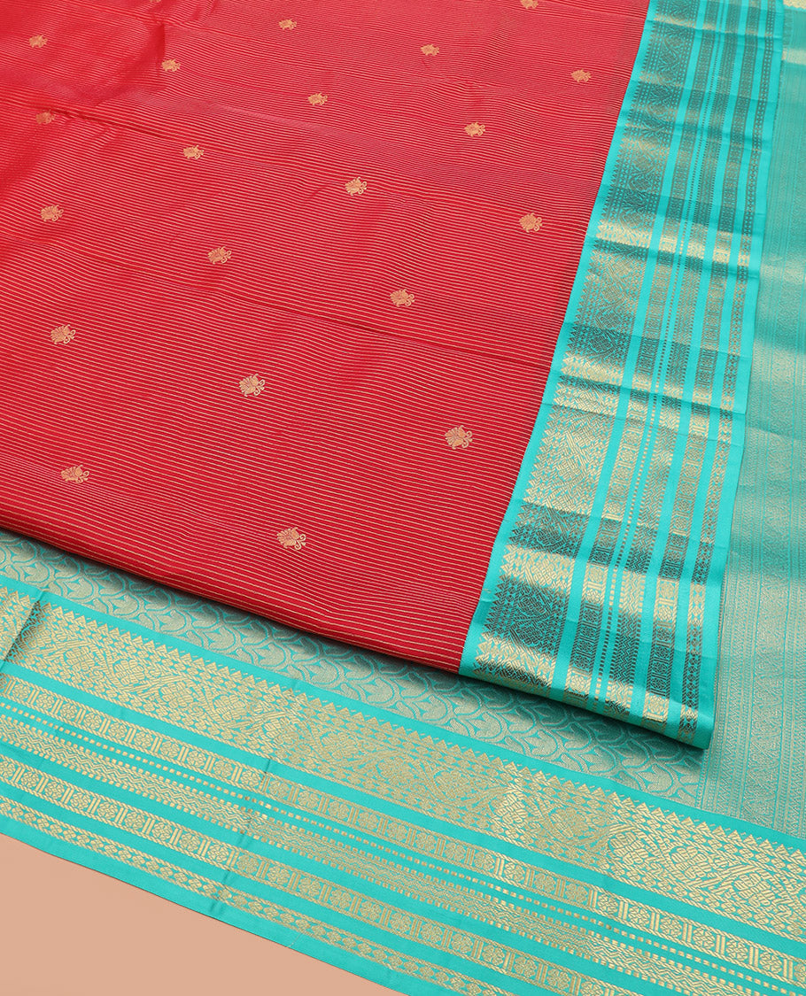 Red Vasundhara Lite Silk Mix Saree, Meticulously Crafted with Zari Buttas and Zari Stripes, Complemented by Contrast Border of Rekku, Rudraksham, Kodi Visiry, Muthu, and Kamalam Designs, Pallu Featuring Scallop Designs, and Paired with a Contrast Blouse