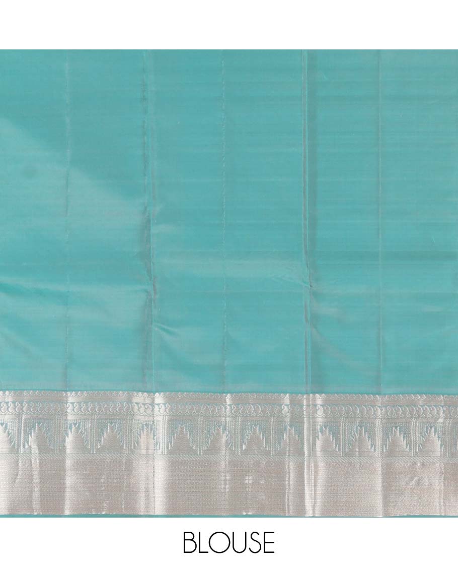 Peach zari buttas Vasundhara silk mix saree, contrast border of thilakam mokku, manga, mayil, neli, thazampoo rekku, and muthu designs, and jaal pallu