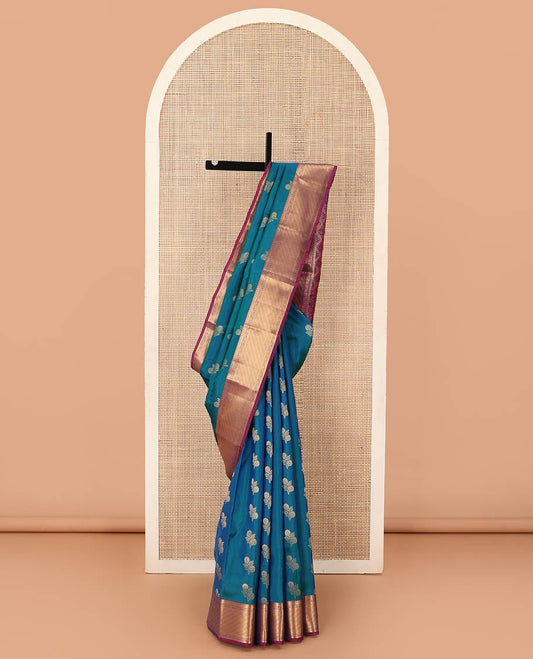 Blue zari buttas Vasundhara silk mix saree, contrast border of kodi visiry, and Greek key designs, and ogee patterned pallu