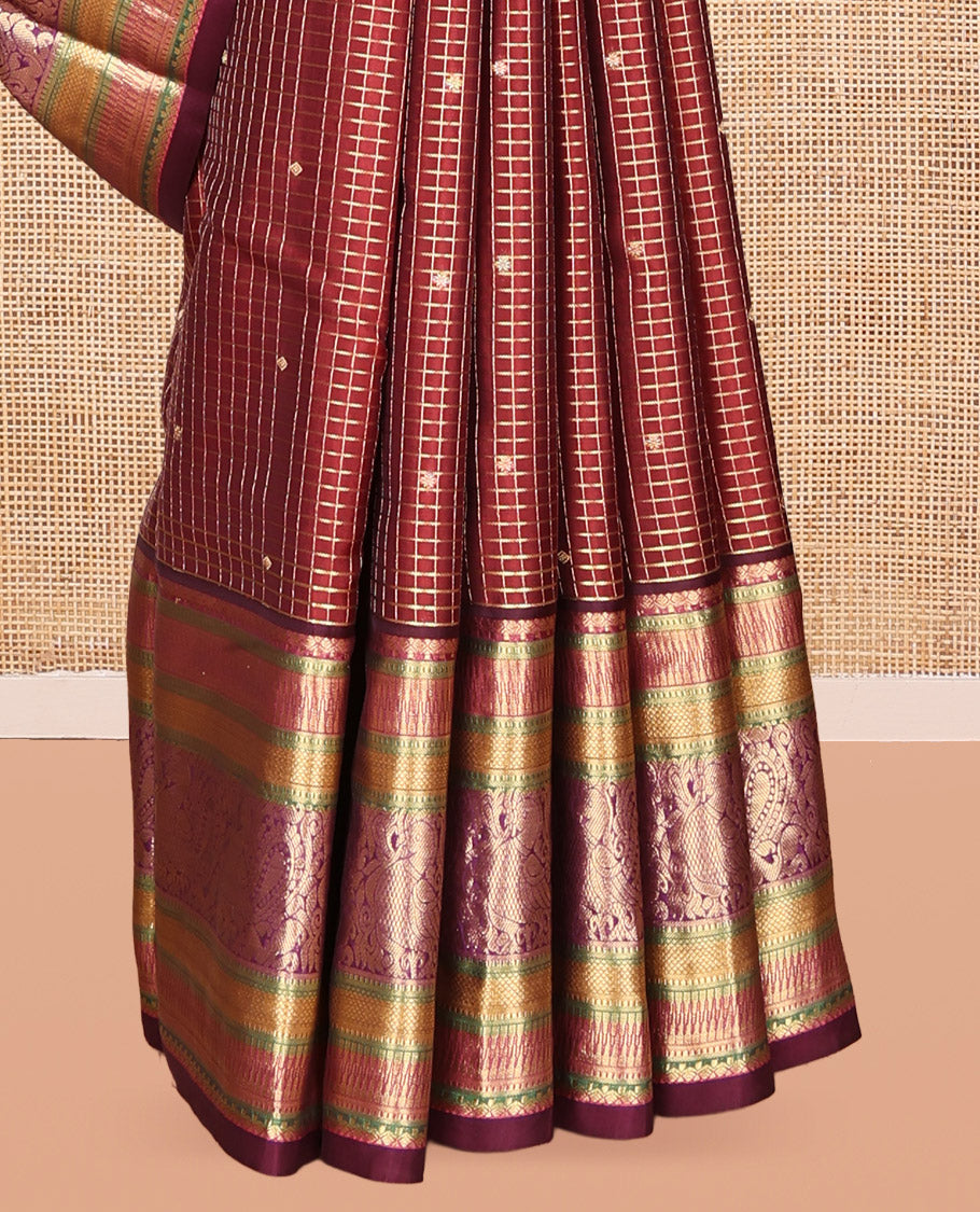Maroon Vasundhara Lite Silk Mix Saree, Adorned with Zari Butta Enclosed Checks, a Zari Border of Rekku, Kuyil Kann, and Mayil Designs, Grand Pallu, and a Matching Blouse