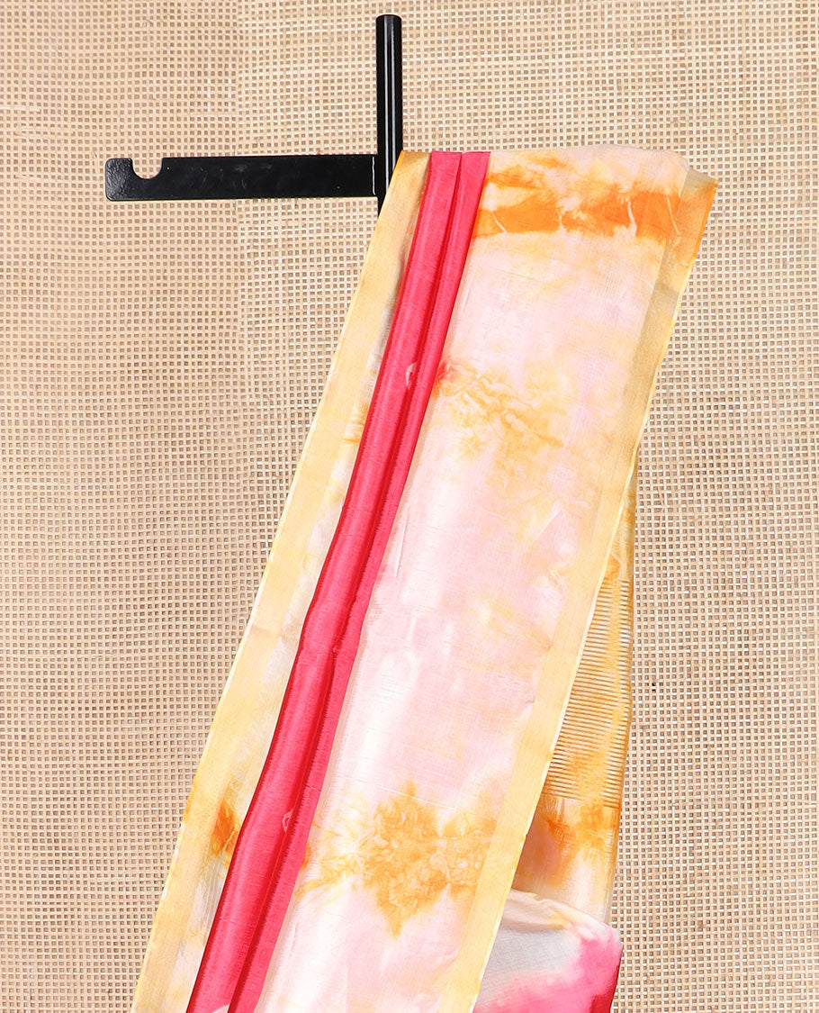 Pink shibori printed banana pith saree, contrast shibori printed border, and zari striped pallu