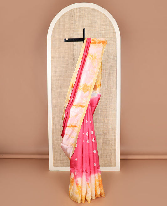 Pink shibori printed banana pith saree, contrast shibori printed border, and zari striped pallu