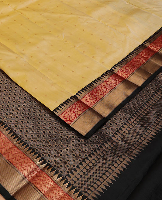 Yellow buttas silksaree,contrast thilakam butta enclosed checked pallu & border of rekku,kathir,stripes & kodi visiry
