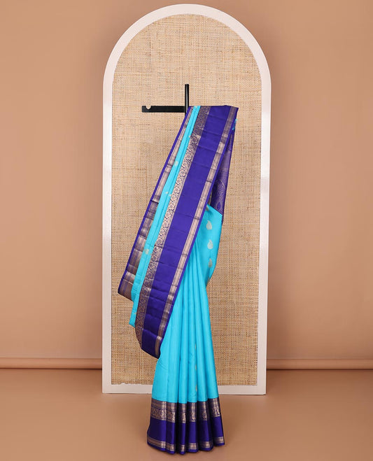 Blue zari buttas silk saree, contrast border of thilakam,neli,mayil kann & kodi visiry design & manga design pallu