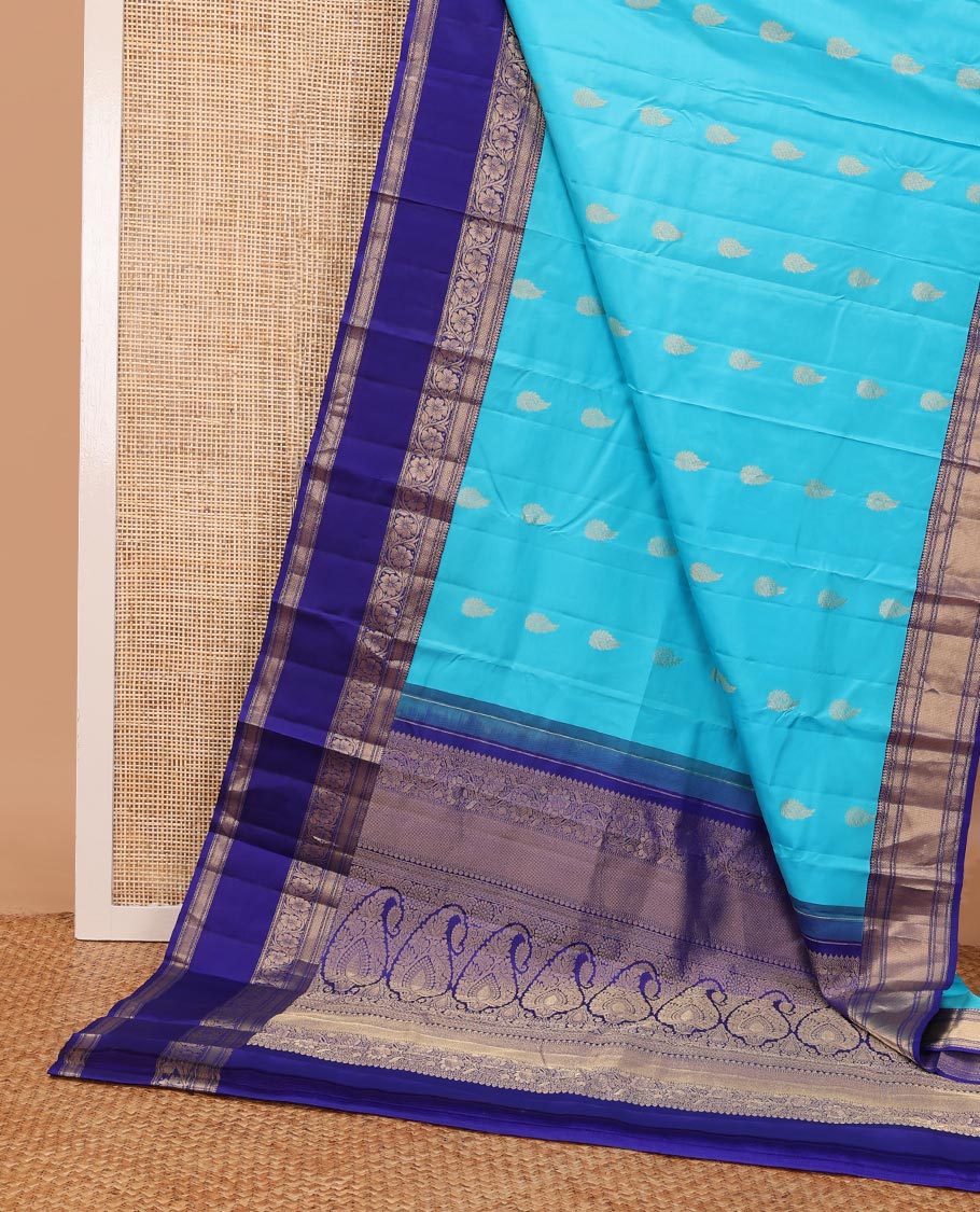 Blue zari buttas silk saree, contrast border of thilakam,neli,mayil kann & kodi visiry design & manga design pallu