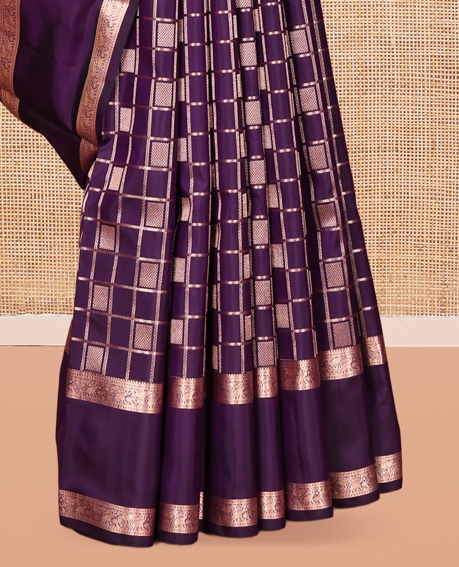 Purple Vasundhara Silk Saree, Decorated with a Zari Checked Design, Highlighted by a Zari Rettai Pettu Border of Yaanai Designs, Jaal Pallu, and a Matching Blouse