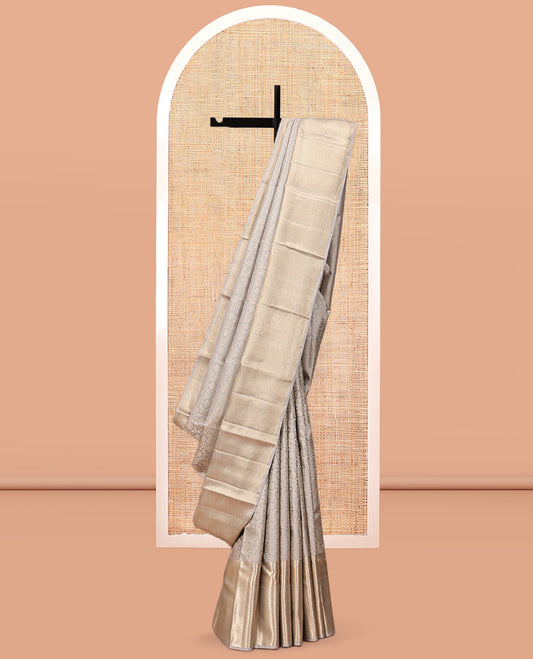Grey Kanchipuram Wedding Silk Saree Features Jacquard Design, a Zari Border of Thilakam Mokku, Vanki, and Jaal Designs, Grand Pallu, and a Matching Blouse