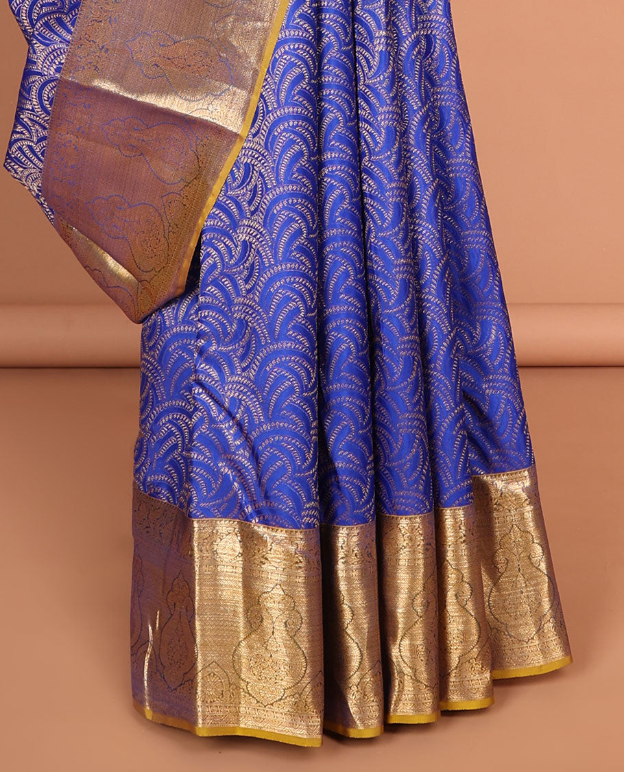 Blue geometric kancheepuram silk saree with contrast floral zari border & paisley design pallu