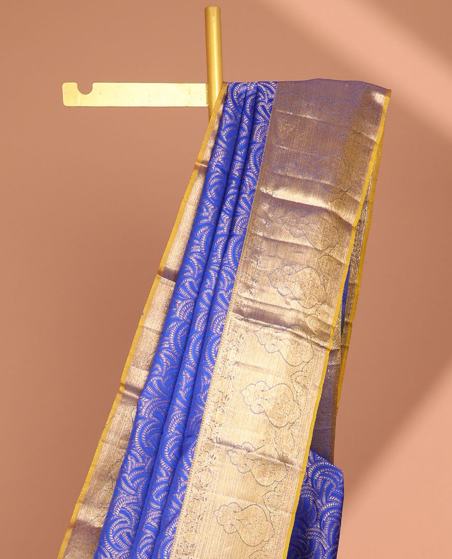 Blue geometric kancheepuram silk saree with contrast floral zari border & paisley design pallu