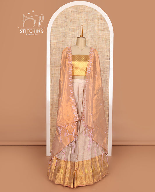 Beige art silk half-saree, brocade with contrast traditional border skirt, contrast brocade blouse, scallop embroidered dhavani, and detachable belt