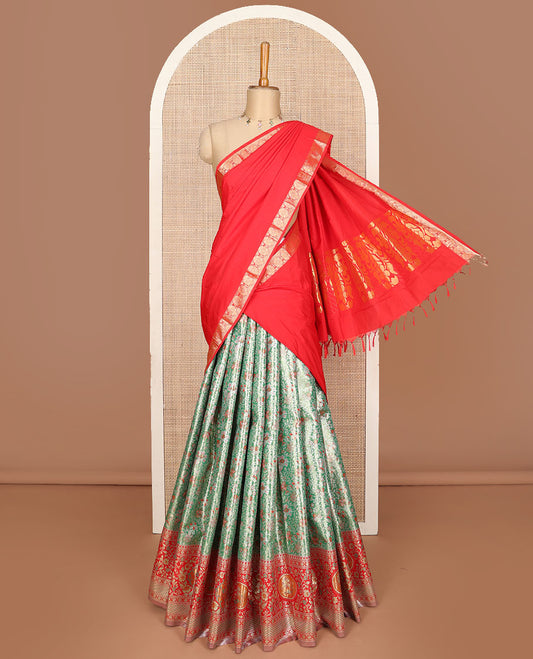 Green art silk half saree, floral meena jacquard with contrast meenakari floral design border skirt,  jacquard contrast blouse and zari woven dhavani