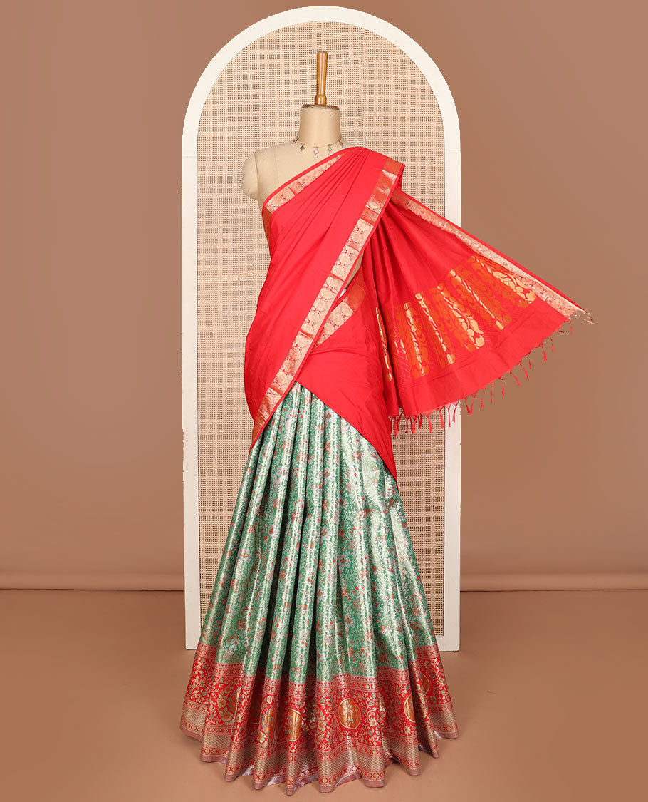 Green art silk half saree, floral meena jacquard with contrast meenakari floral design border skirt,  jacquard contrast blouse and zari woven dhavani