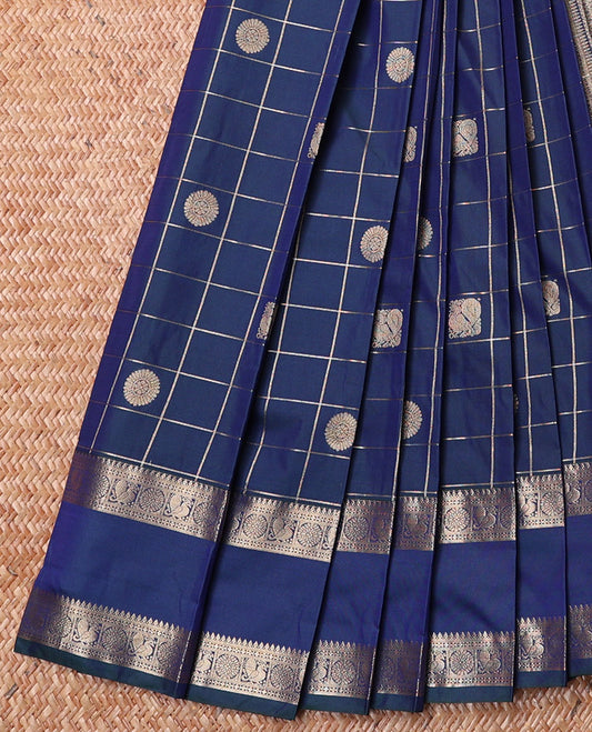 Blue Budget Silk Saree, Elegantly Decked Up with Peacock-Chakram Butta Enclosed Checked Body, Highlighted by a Traditional Zari Design Rettai Pettu Border, Jaal Pallu, and Paired with a Matching Blouse