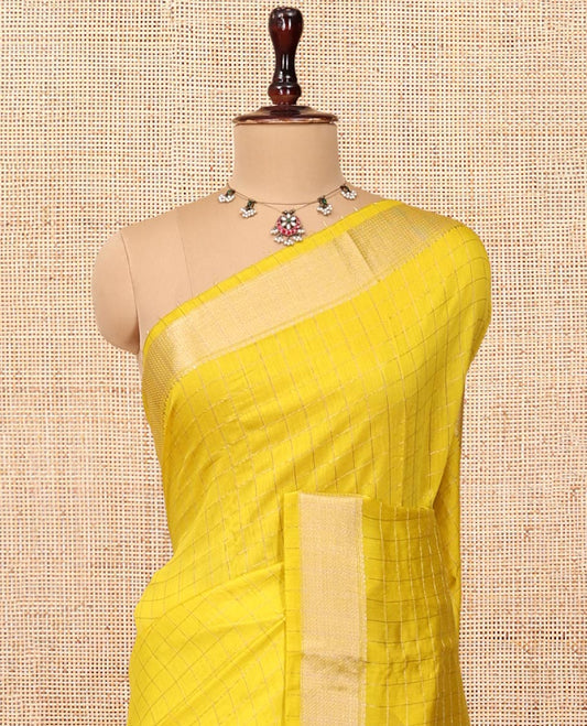 Yellow Assam Silk Saree, Accentuated with Zari Checks, Highlighted by Zari Border, Gleaming Zari Striped Pallu, and a Matching Blouse