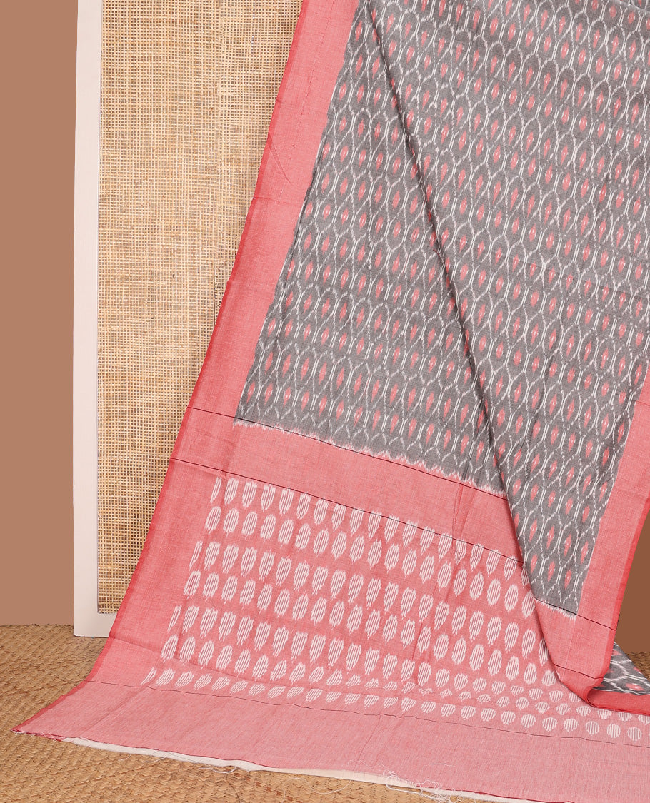 Grey ogee patterned ikkat cotton saree, contrast plain border, and pallu of buttas