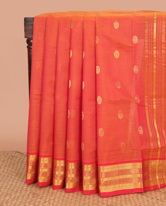Orange chakram buttas Venkatagiri cotton saree, contrast traditional zari border, and zari striped pallu