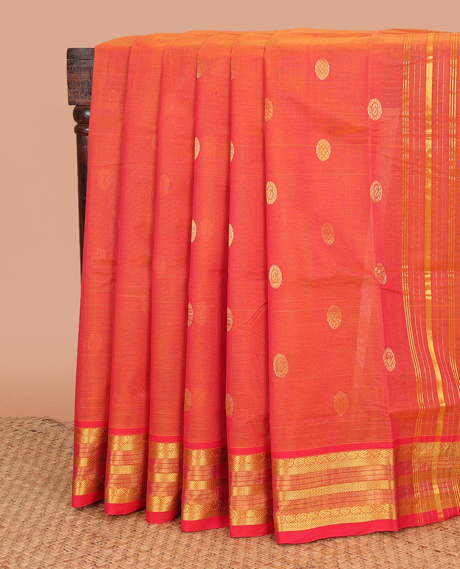 Orange chakram buttas Venkatagiri cotton saree, contrast traditional zari border, and zari striped pallu