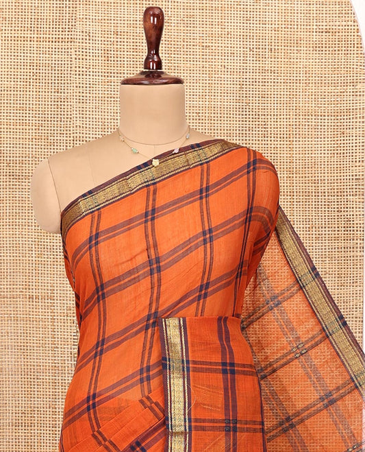 Orange Andhra Cotton Saree, Decorated with Checked Design All Over Its Body, Subtly Sparked with a Traditional-Patterned Border, Contrast Pallu of Stripes and Ikkt Floral Buttas, and Paired with a Matching Blouse