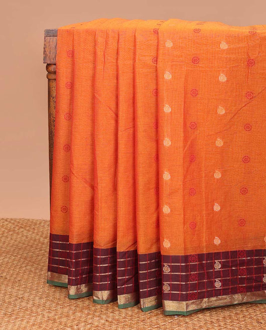 Orange chakra, and paisley buttas Coimbatore cotton saree, contrast butta enclosed checked border, and pallu of paisleys and chevron design