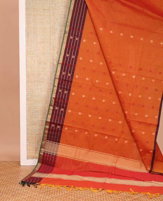 Orange chakra, and paisley buttas Coimbatore cotton saree, contrast butta enclosed checked border, and pallu of paisleys and chevron design