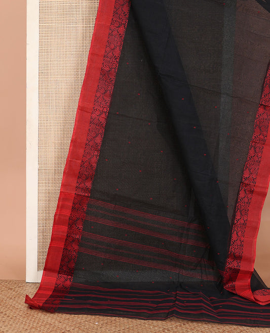 Black Bengal Cotton Saree, Beautified with Buttas All Over Its Body, Complemented by a Contrast Floral Creeper Border, and Pallu Steeped with Stripes