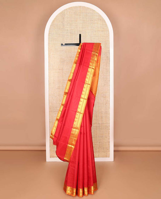 Red striped kancheepuram silk saree with contrast border of manga, kathir design & argyle design pallu