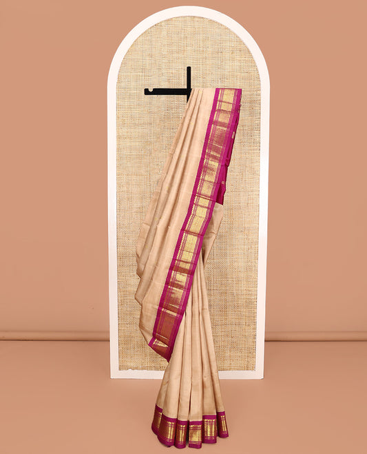 Sandal Kanchipuram Silk Saree, Beautifully Bedecked with Zari Buttas All Over Its Body, Complemented by a Contrast One-Sided Border of Salngai, Banaras, and Jaal Designs, Pallu of Zari Designs, and Comes Without a Blouse