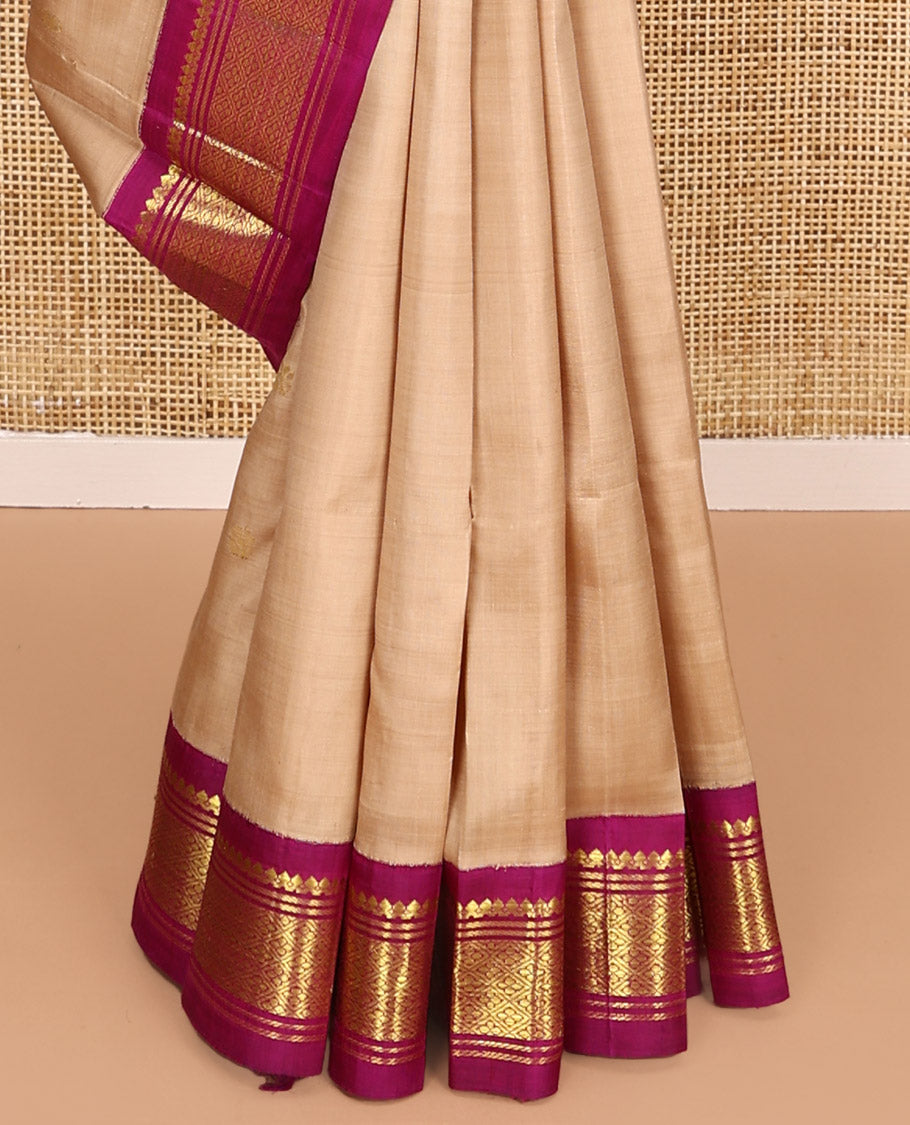 Sandal Kanchipuram Silk Saree, Beautifully Bedecked with Zari Buttas All Over Its Body, Complemented by a Contrast One-Sided Border of Salngai, Banaras, and Jaal Designs, Pallu of Zari Designs, and Comes Without a Blouse