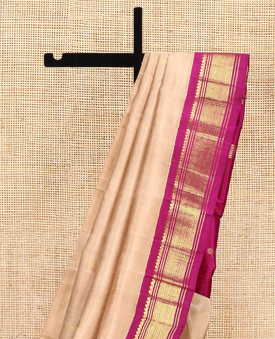 Sandal Kanchipuram Silk Saree, Beautifully Bedecked with Zari Buttas All Over Its Body, Complemented by a Contrast One-Sided Border of Salngai, Banaras, and Jaal Designs, Pallu of Zari Designs, and Comes Without a Blouse