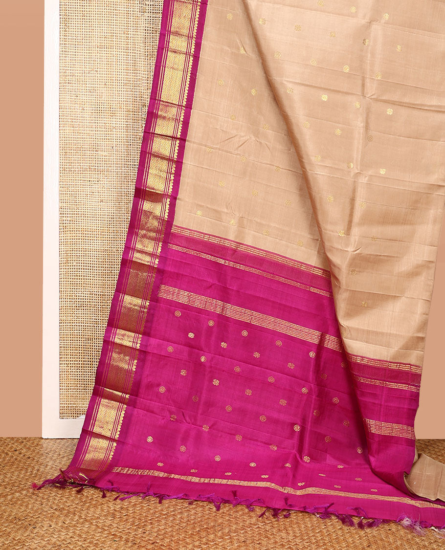 Sandal Kanchipuram Silk Saree, Beautifully Bedecked with Zari Buttas All Over Its Body, Complemented by a Contrast One-Sided Border of Salngai, Banaras, and Jaal Designs, Pallu of Zari Designs, and Comes Without a Blouse
