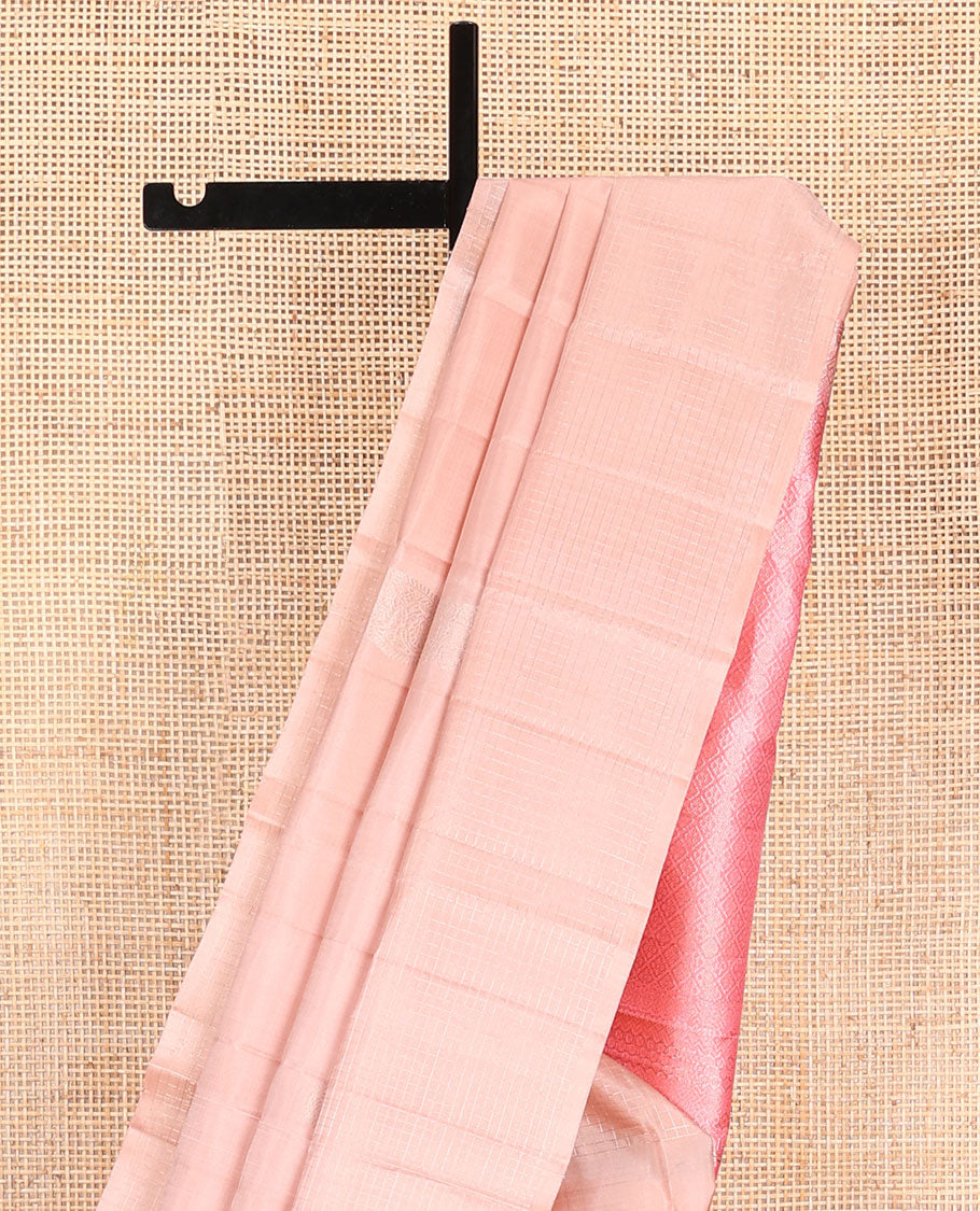 Peach manga buttas and zari checked Kanchipuram silk saree, contrast pallu of thazampoo rekku, diamond, rudraksham, and jaal designs