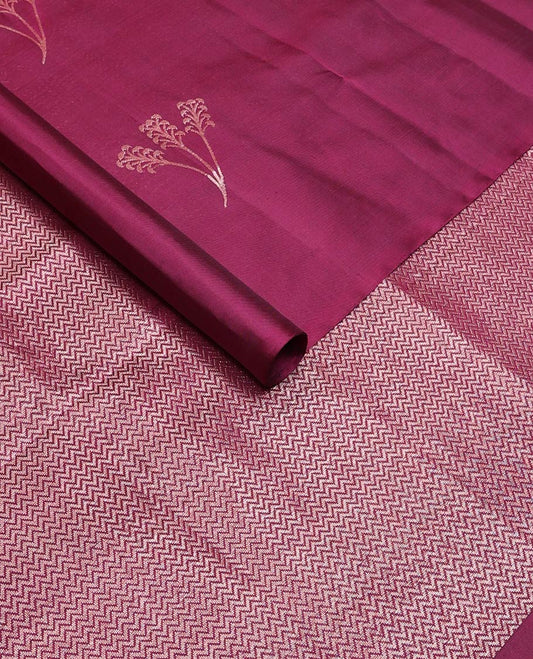 Borderless purple floral buttas soft silk saree, gleaming zari pallu of vanki designs