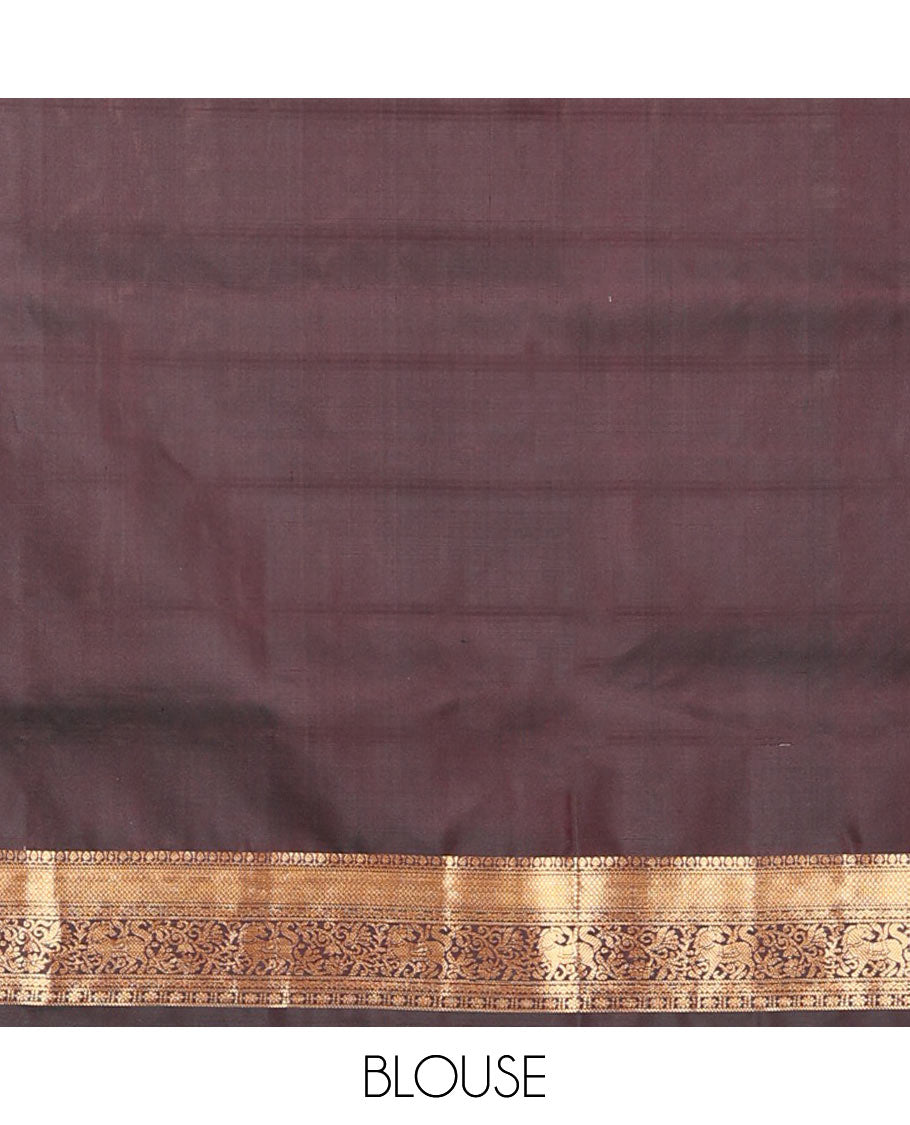 Brown maan and kuthirai butta enclosed checked soft silk saree, zari border of thilakam, mayil kann, kuthirai, and kamalam designs, and jaal pallu