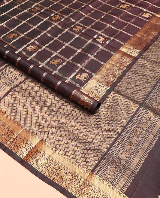 Brown maan and kuthirai butta enclosed checked soft silk saree, zari border of thilakam, mayil kann, kuthirai, and kamalam designs, and jaal pallu
