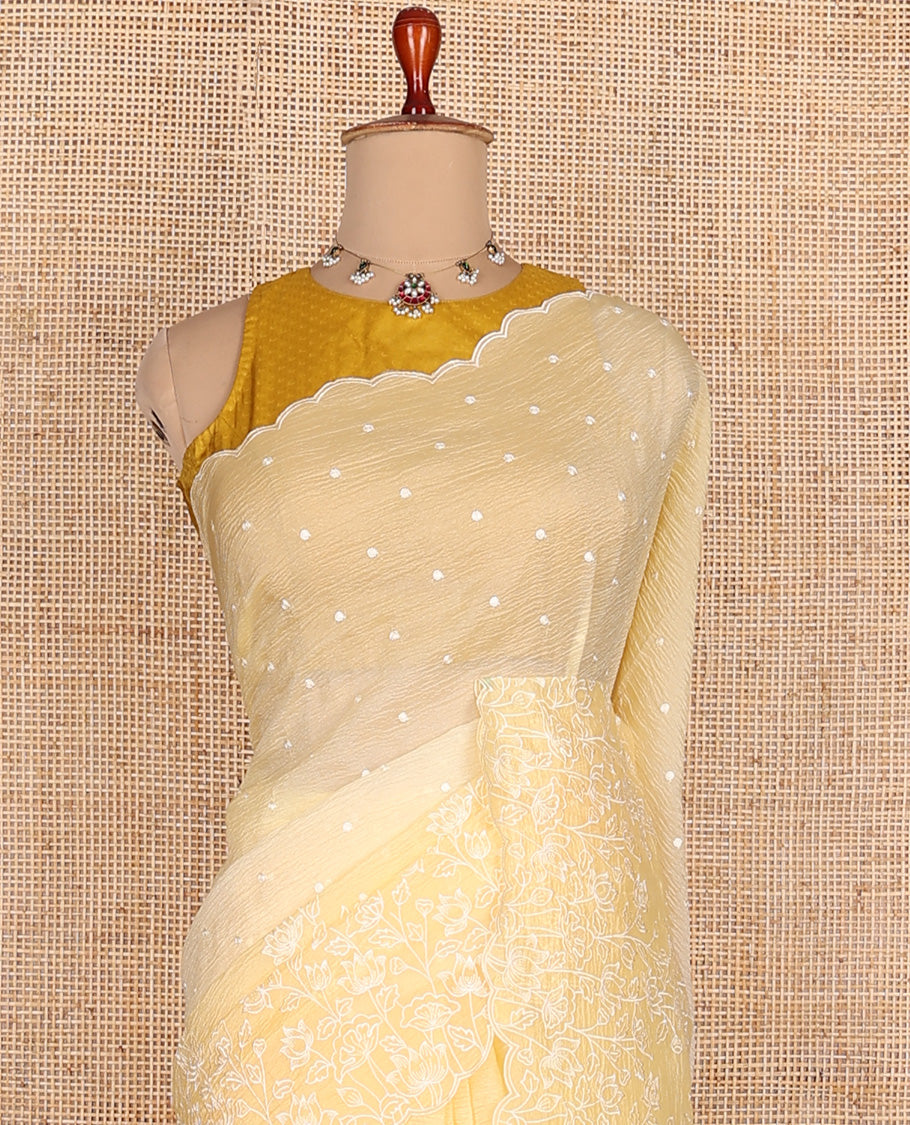 Yellow dots thread embroidered designer saree, scallop floral vine design embroidered border