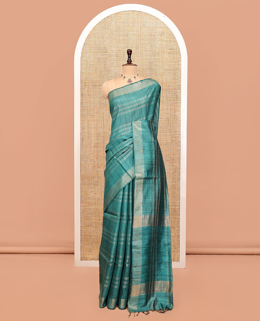 Green Tussar Silk Saree, Sparsely Threaded with Stripes, a Subtle Border, a Self-Pallu, and a Matching Blouse
