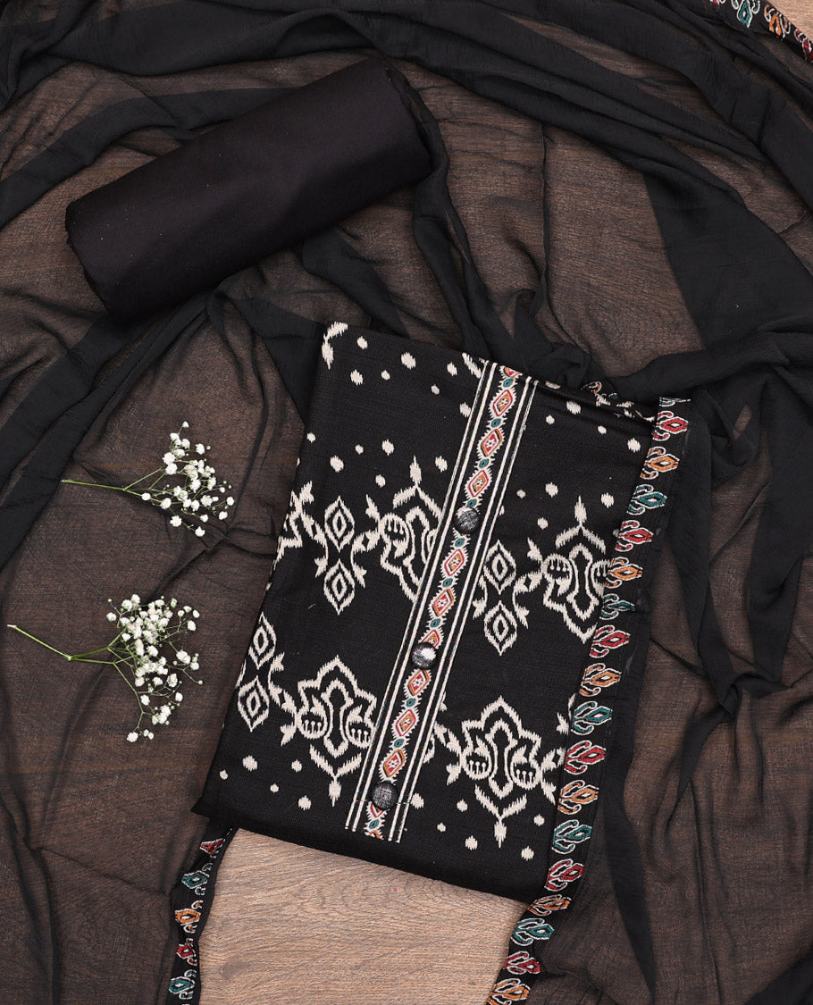 Black Material Chudidar Set, Mesmerized with Ikkat-Style Motifs Print on Rayon Top, a Plain Cotton Bottom, and Paired with a Plain Chiffon Dupatta