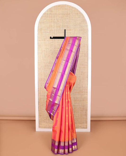 Peach leaf motifs vasundhara elite silk saree with contrst vanki, checked dsign border & leaf jaal pallu