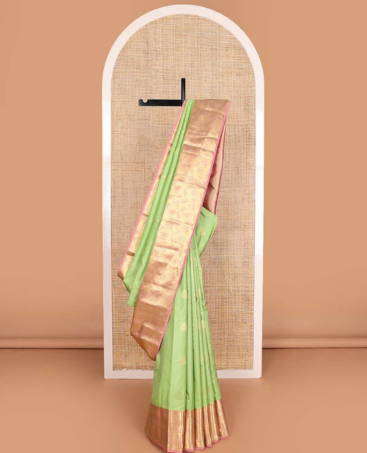 Green zari design Vasundhara silk mix saree, contrast floral zari design border, and thilakam design pallu