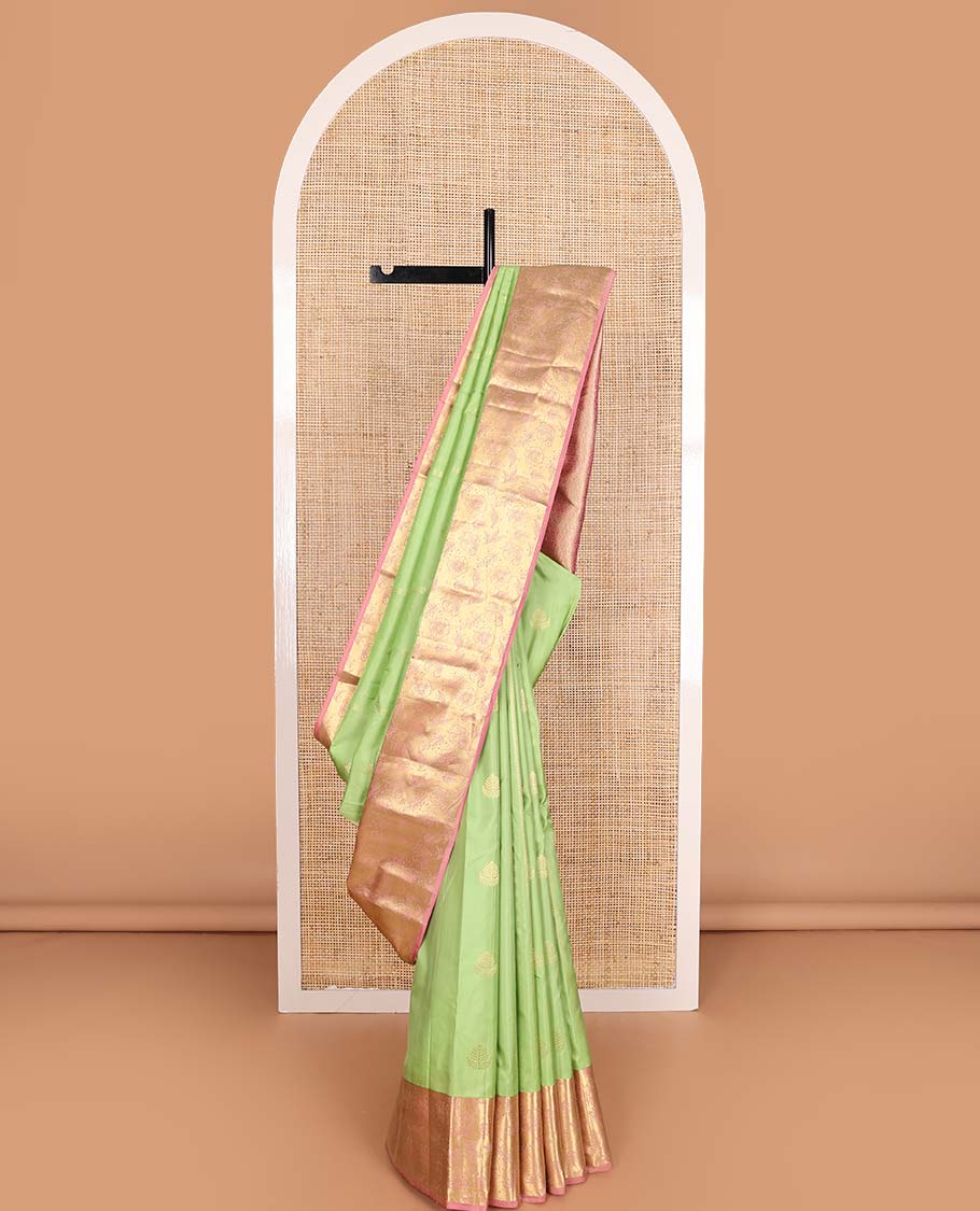 Green zari design Vasundhara silk mix saree, contrast floral zari design border, and thilakam design pallu