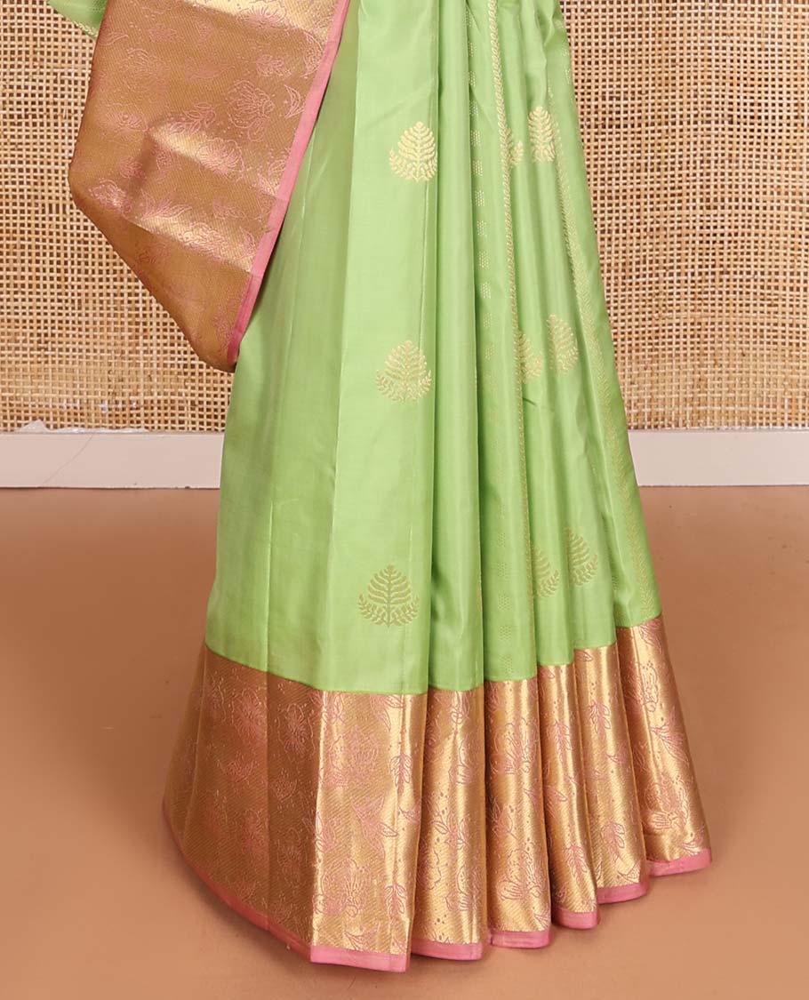 Green zari design Vasundhara silk mix saree, contrast floral zari design border, and thilakam design pallu