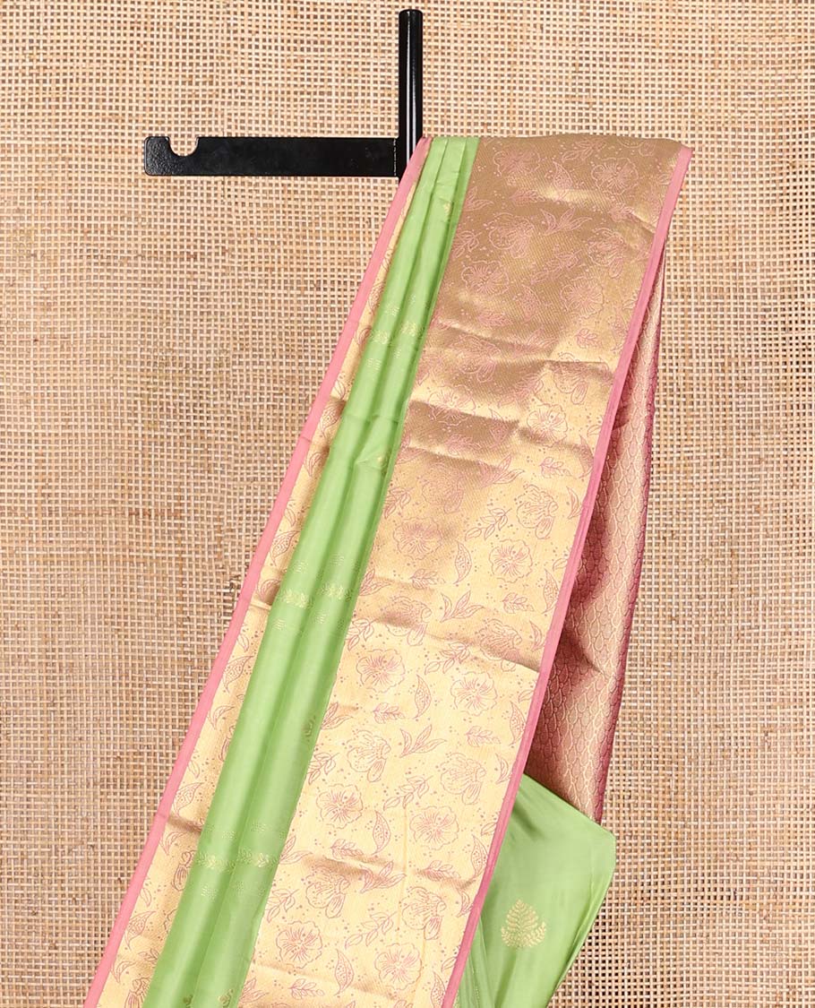 Green zari design Vasundhara silk mix saree, contrast floral zari design border, and thilakam design pallu